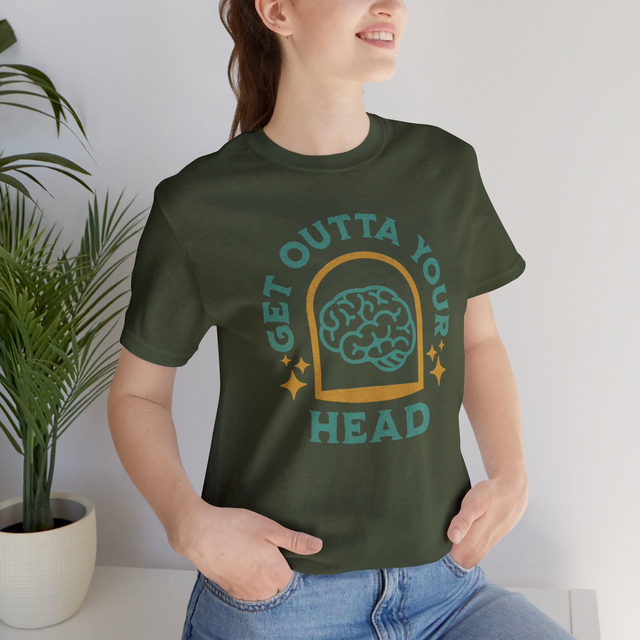 Woman wearing a Get Outta Your Head Military Green Soft Cotton Bella Canvas Tee Cornhole T-Shirt (Unisex)