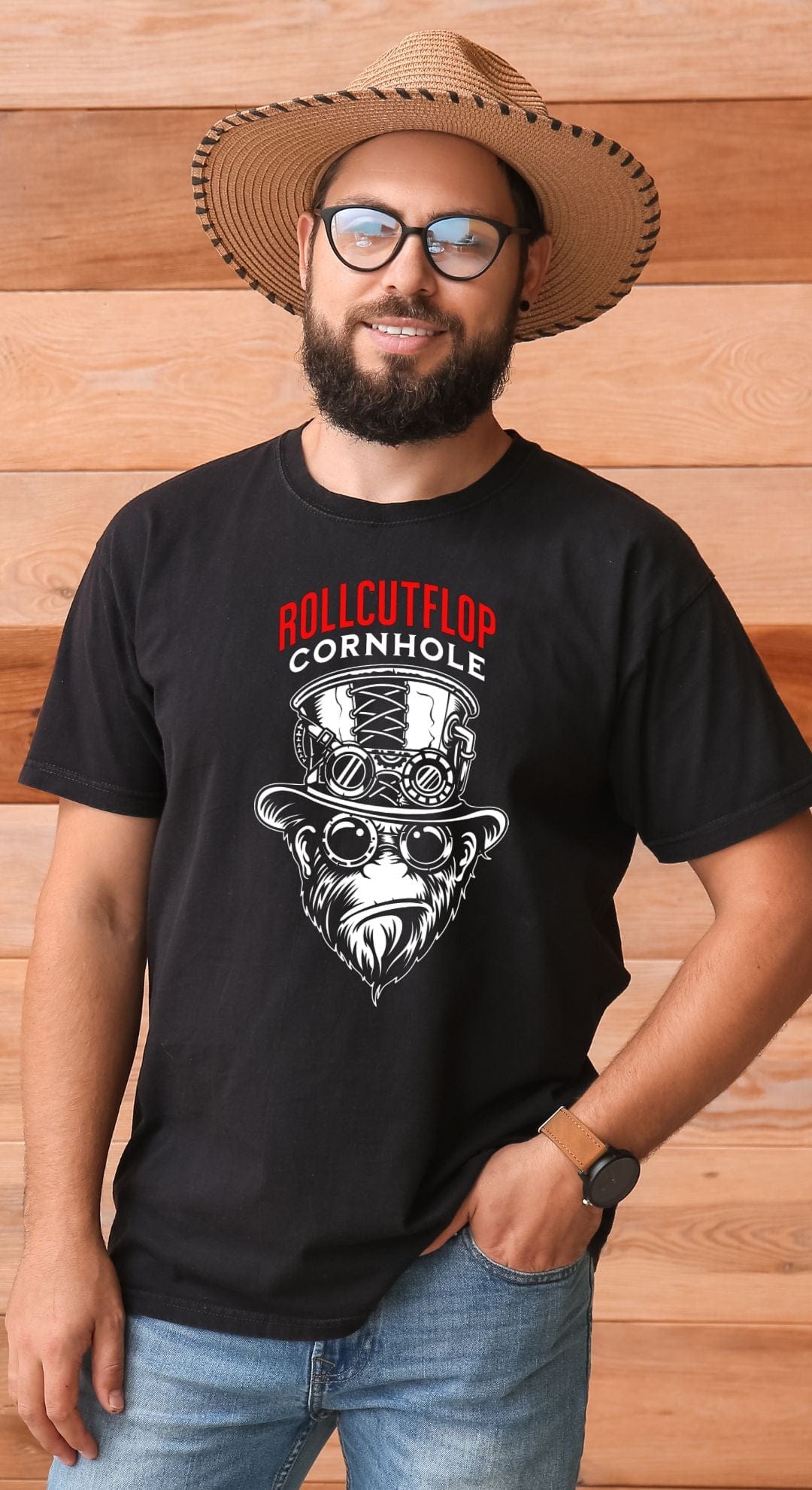 Man in hat wearing Roll Cut Flop Cornhole™ Unisex Black T-shirt - Steampunk Gorilla Face & Gears